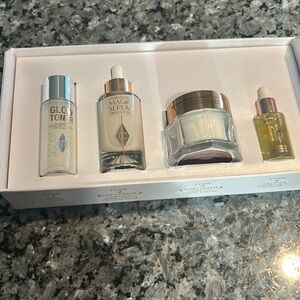 CHARLOTTE TILBURY HYDRATED GLOWING SKIN 4-PIECE GIFT SET…NEVER USED..
